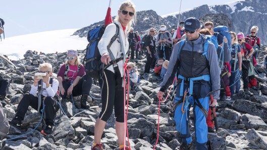 Guide Amund Mundhjell (til høyre) sier at det må legges ekstra til rette for det dersom barn i barnehagealder skal komme seg til topps på Galdhøpiggen.. Guide Amund Mundhjell (til høyre) sier at det må legges ekstra til rette for det dersom barn i barnehagealder skal komme seg til topps på Galdhøpiggen..